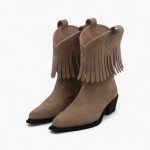بوت جیر فرینج زنانه، Western Fringe Boot، Nude Rider FW25، Maison Mazaheriyan، بوت پاشنه بلوک Rock-Luxe، بوت نود مجستیک، Low Rider Boot Suede, FW25 Collection, Luxury Suede Ankle Boots, Boho Western Style, Mazaheriyan Footwear.